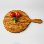 Planche de présentation ronde avec poignée en bois d’olivier