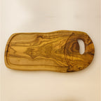 Planche de présentation à forme irrégulière avec poignée en bois d’olivier